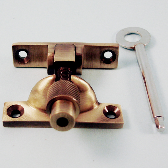 THD185L/AB • Locking • Antique Brass • Locking Narrow Brighton Pattern Sash Fastener